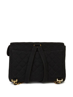 1995 Jumbo CC turn-lock flap wool backpack