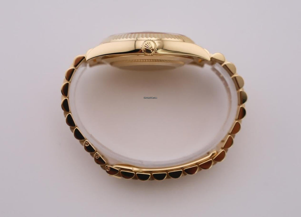 Rolex | Day-Date | 228238-0006 | Yellow gold | 40 mm | Yellow gold | Champagne | Automatic