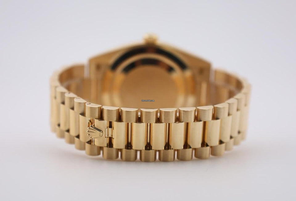 Rolex | Day-Date | 228238-0006 | Yellow gold | 40 mm | Yellow gold | Champagne | Automatic