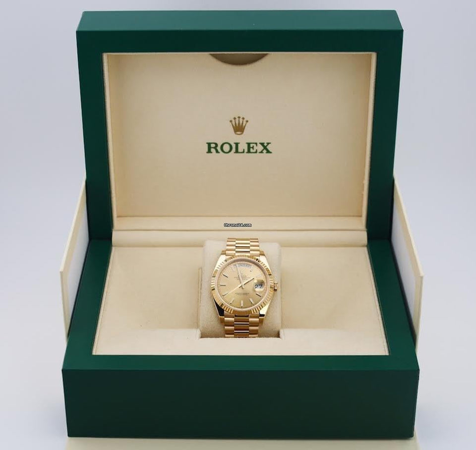 Rolex | Day-Date | 228238-0006 | Yellow gold | 40 mm | Yellow gold | Champagne | Automatic