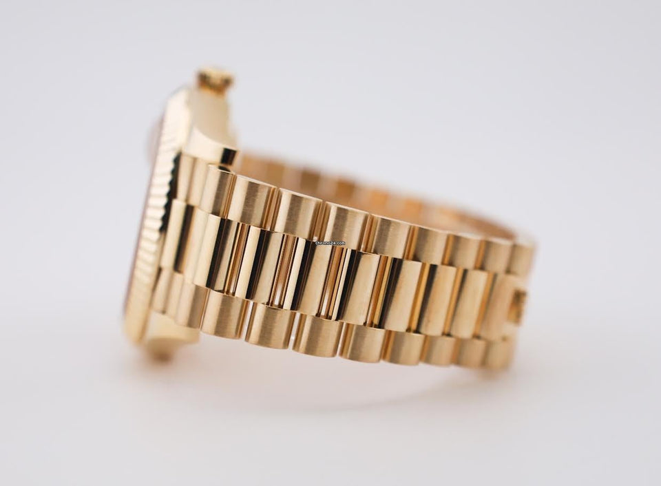 Rolex | Day-Date | 228238-0006 | Yellow gold | 40 mm | Yellow gold | Champagne | Automatic