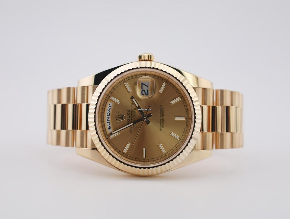 Rolex | Day-Date | 228238-0006 | Yellow gold | 40 mm | Yellow gold | Champagne | Automatic