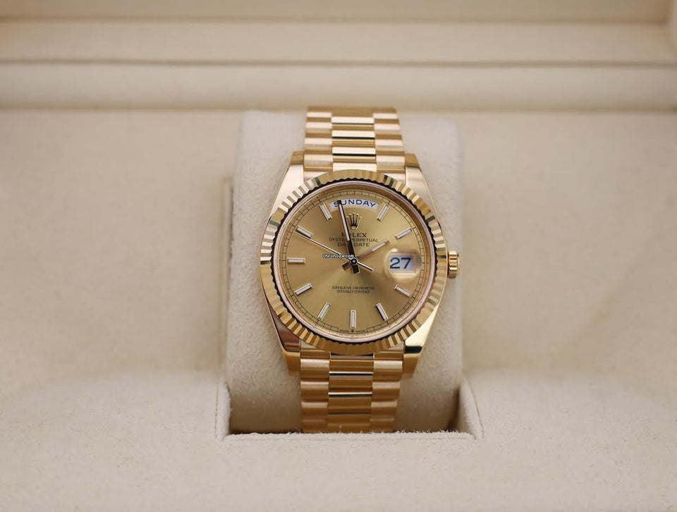 Rolex | Day-Date | 228238-0006 | Yellow gold | 40 mm | Yellow gold | Champagne | Automatic