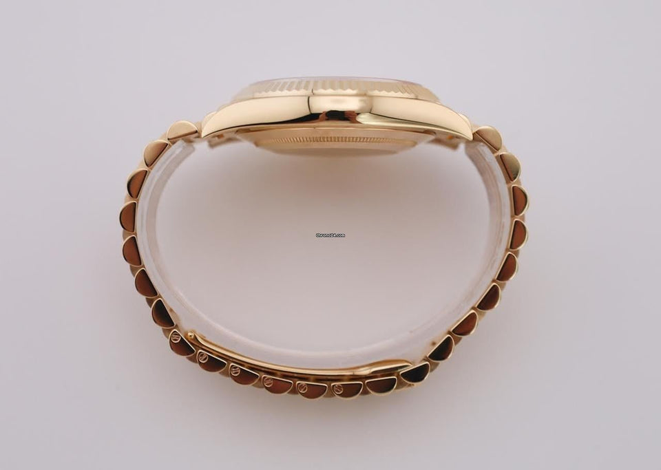 Rolex | Day-Date | 228238-0006 | Yellow gold | 40 mm | Yellow gold | Champagne | Automatic