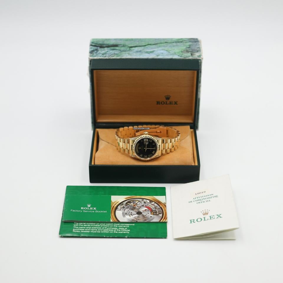 Rolex | Day-Date | 18018 | Yellow gold | 36 mm | Yellow gold | Black | Automatic