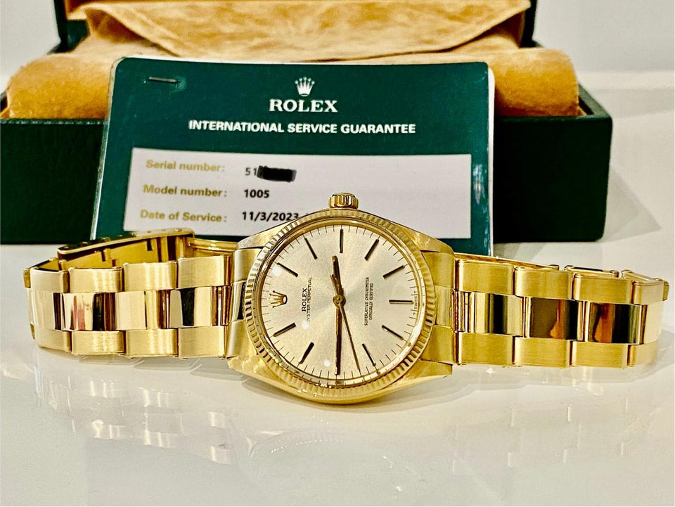 Rolex | Oyster Perpetual | 1005 | Yellow gold | 34 mm | Yellow gold | Silver | Automatic
