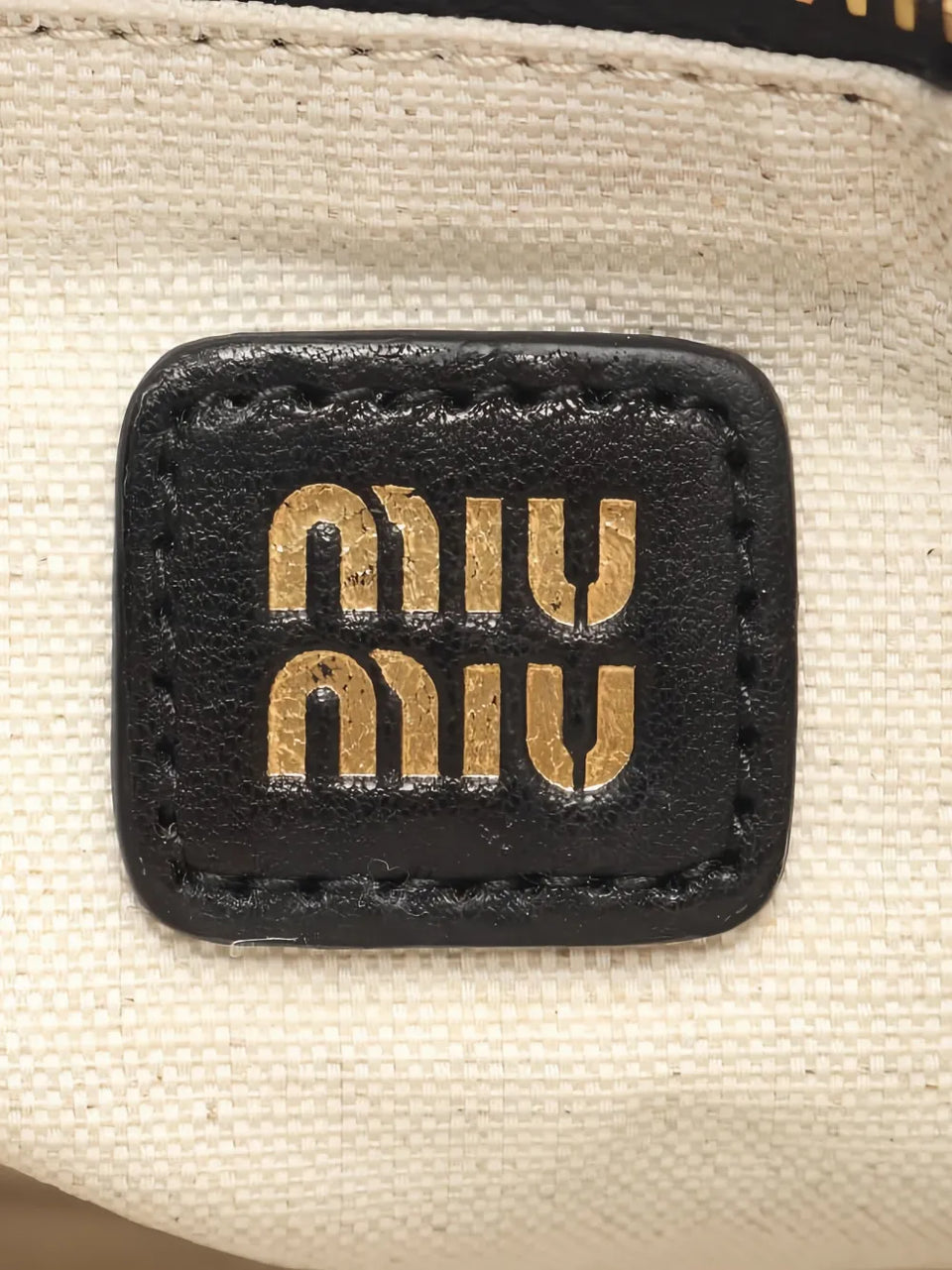 2020s embossed-leather shoulder bag