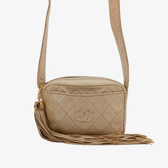 RA862 - CHANEL Vintage Beige Lambskin Tassel Camera Bag