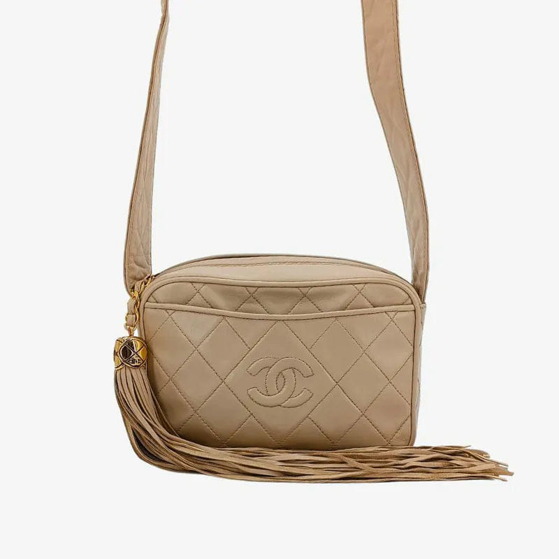 RA862 - CHANEL Vintage Beige Lambskin Tassel Camera Bag