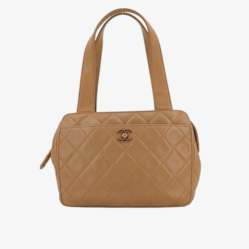 RA491 - CHANEL Vintage Beige Lambskin Quilted Handbag