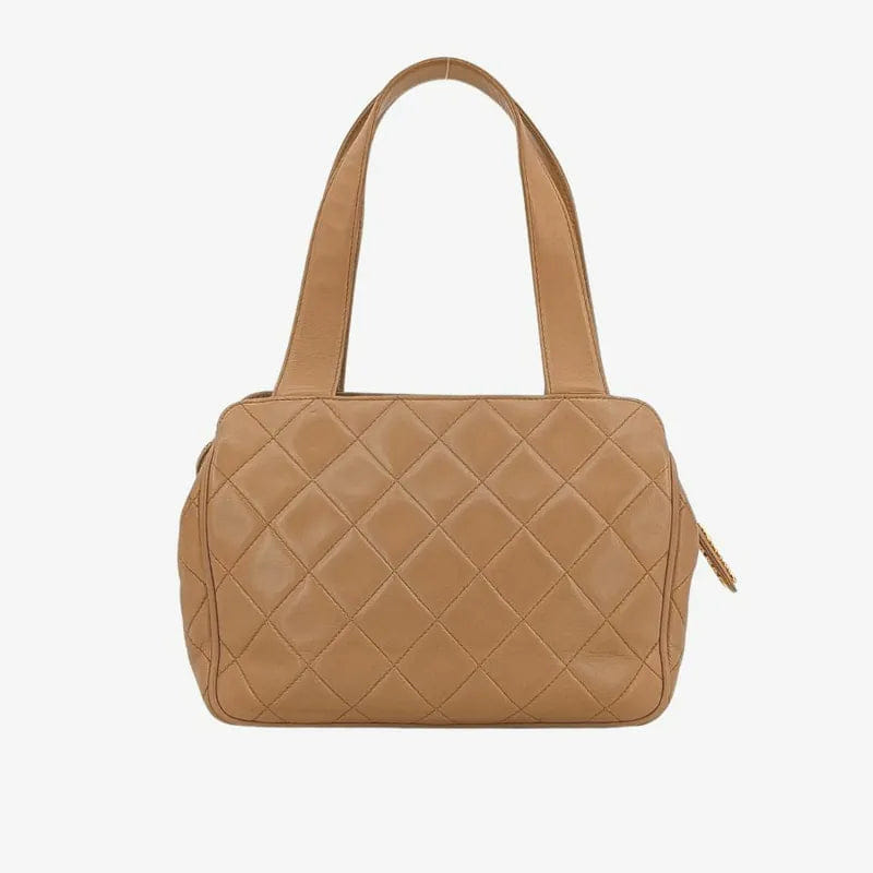RA491 - CHANEL Vintage Beige Lambskin Quilted Handbag