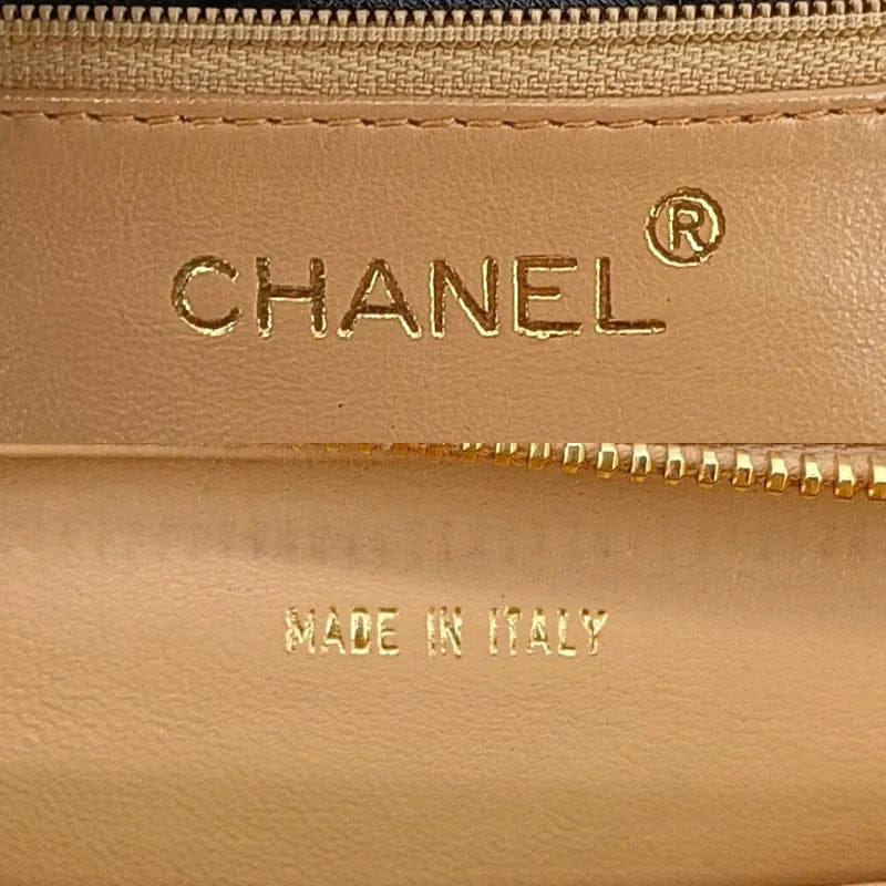 RA491 - CHANEL Vintage Beige Lambskin Quilted Handbag