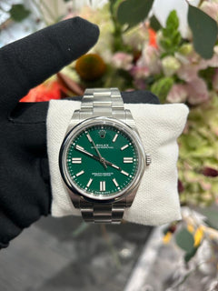 Rolex | Oyster Perpetual | 1100 | Steel | 41 mm | Steel | Green | Automatic