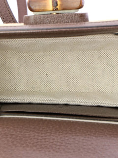 Bamboo 1947 Top Handle Bag Jumbo GG Canvas Mini crossbody bag