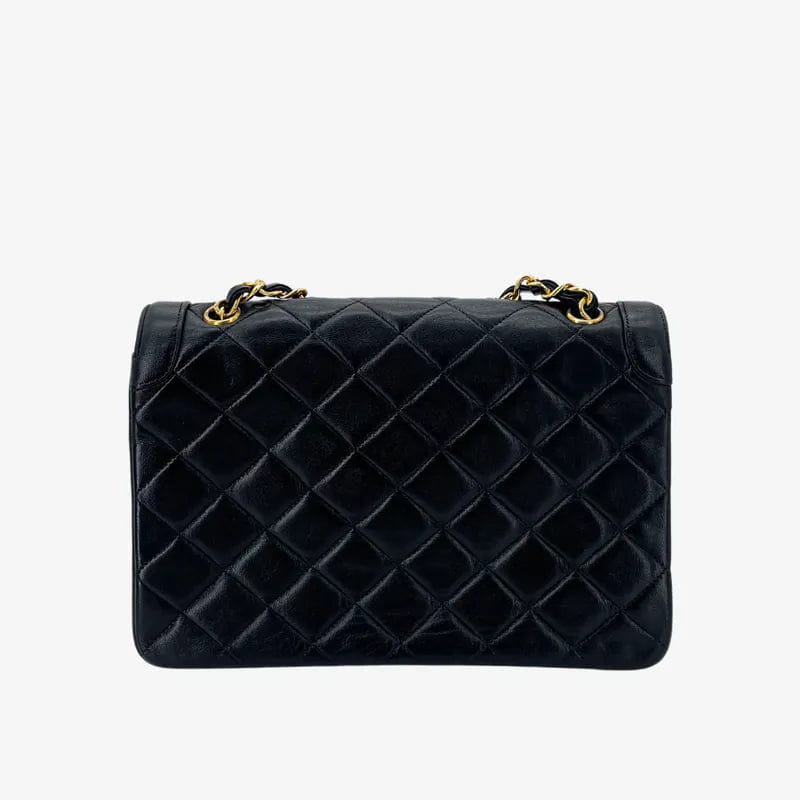 RA652 - CHANEL Vintage Black Lambskin Quilted Flap Bag