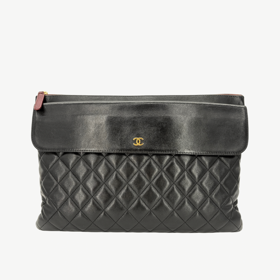 RG370 - CHANEL Vintage Black Lambskin Zip And Flap Clutch Bag