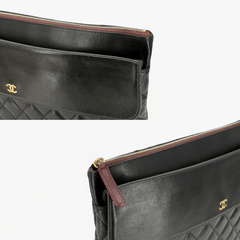 RG370 - CHANEL Vintage Black Lambskin Zip And Flap Clutch Bag