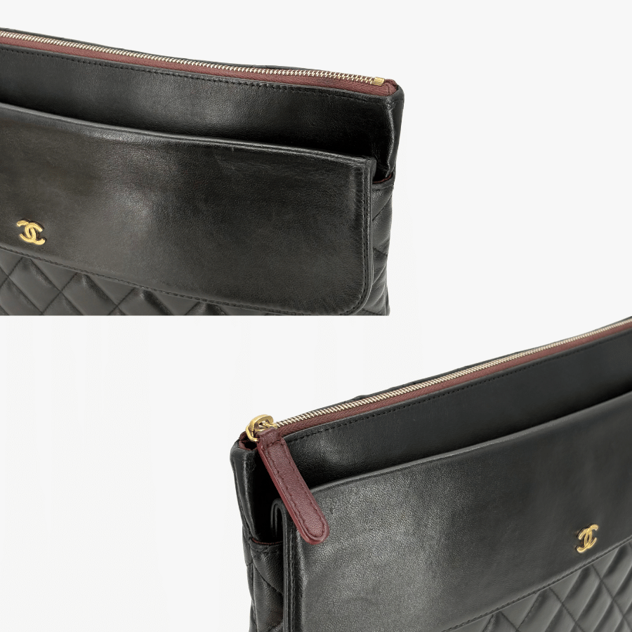 RG370 - CHANEL Vintage Black Lambskin Zip And Flap Clutch Bag