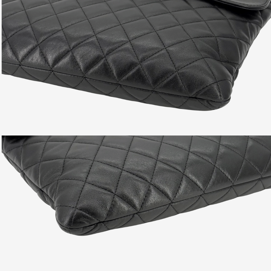 RG370 - CHANEL Vintage Black Lambskin Zip And Flap Clutch Bag