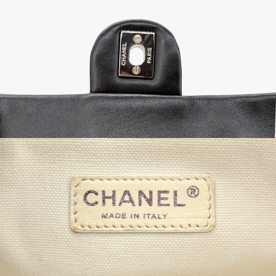 RG367 - CHANEL Black Lmabskin Perforated Flap Bag