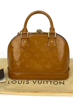 Monogram Vernis Alma shoulder bag