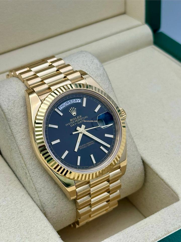 Rolex | Day-Date | 228238 | Yellow gold | 40 mm | Yellow gold | Black | Automatic