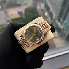 Rolex | Day-Date | 228235 | Rose gold | 40 mm | Rose gold | Green | Automatic