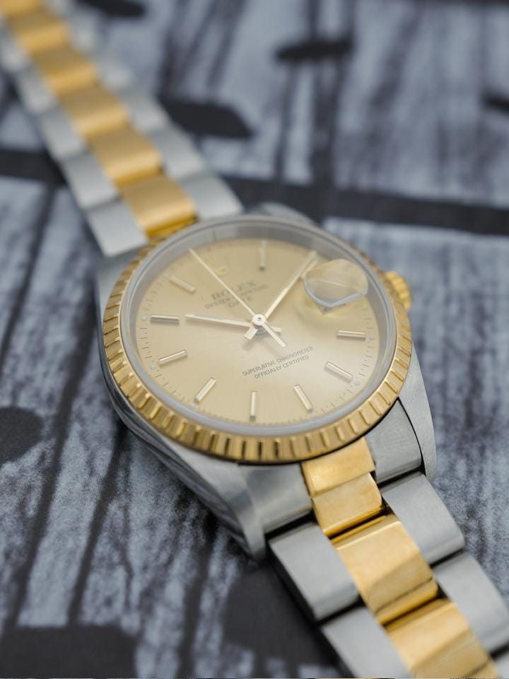 Rolex | Oyster Perpetual | 15233 | Gold/Steel | 34 mm | Gold/Steel | Champagne | Automatic
