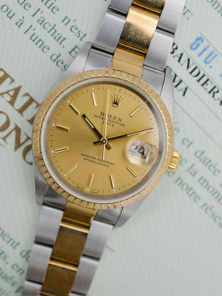 Rolex | Oyster Perpetual | 15233 | Gold/Steel | 34 mm | Gold/Steel | Champagne | Automatic