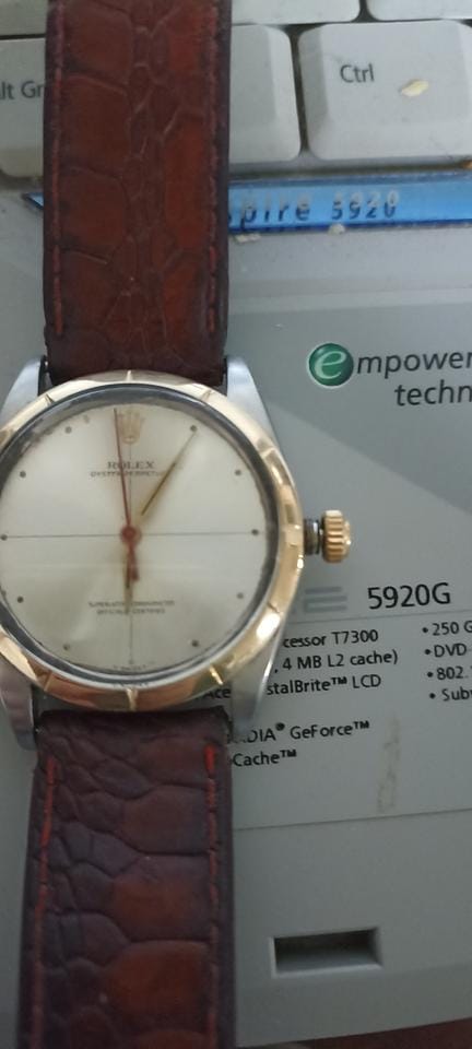 Rolex | Oyster Perpetual | 1003 | Gold/Steel | 34 mm | Leather | Mother of pearl | Automatic