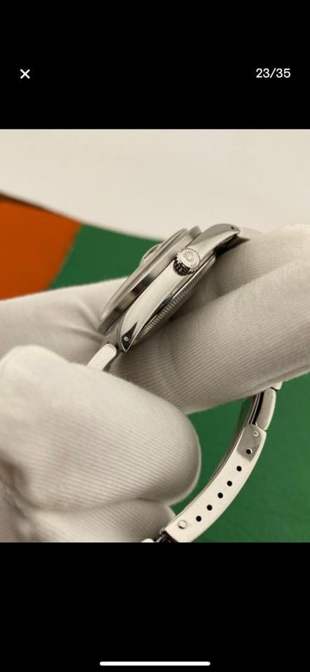 Rolex | Oyster Perpetual | 15210 | Steel | 34 mm | Steel | Champagne | Automatic