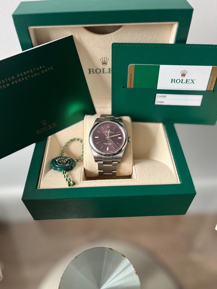 Rolex Oyster Perpetual Fully factory stickered with original box and paper work.