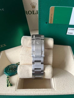 Rolex Oyster Perpetual Fully factory stickered with original box and paper work.