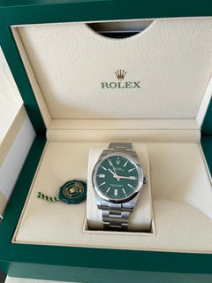 Rolex | Oyster Perpetual | 1100 | Steel | 41 mm | Steel | Green | Automatic