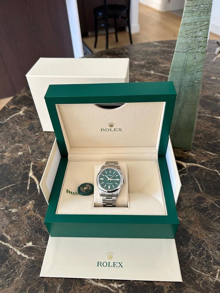 Rolex | Oyster Perpetual | 1100 | Steel | 41 mm | Steel | Green | Automatic