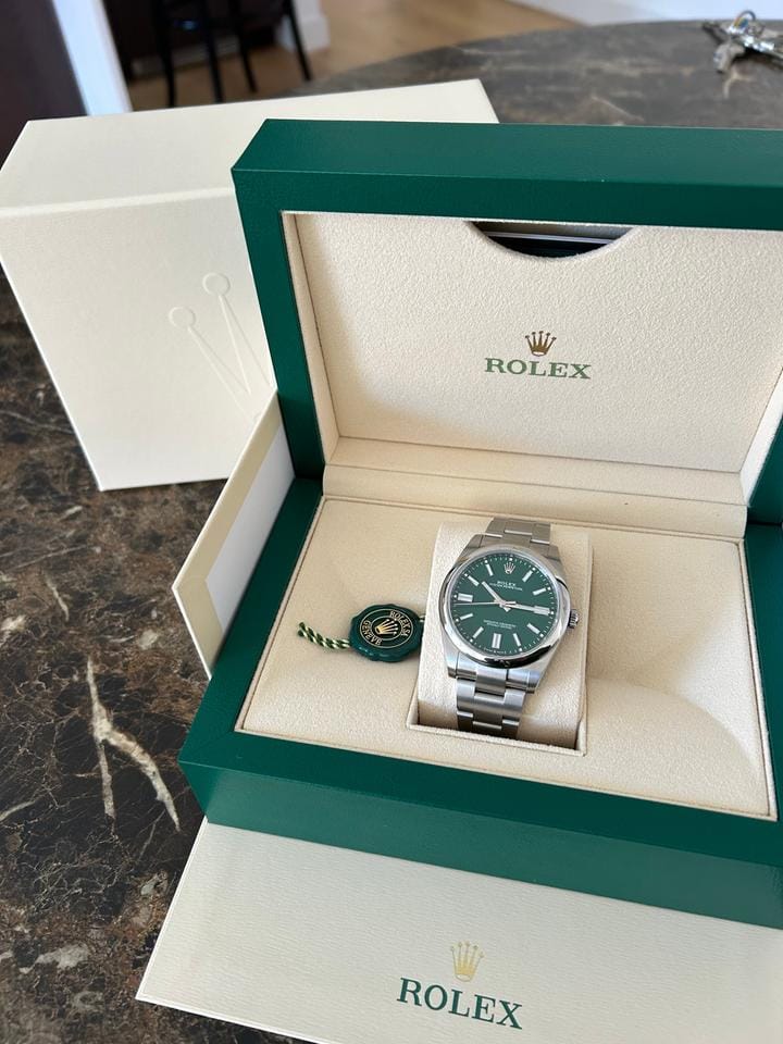 Rolex | Oyster Perpetual | 1100 | Steel | 41 mm | Steel | Green | Automatic