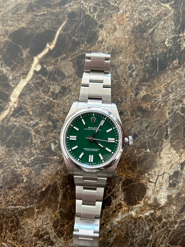 Rolex | Oyster Perpetual | 1100 | Steel | 41 mm | Steel | Green | Automatic