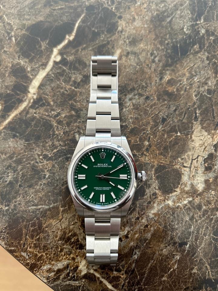 Rolex | Oyster Perpetual | 1100 | Steel | 41 mm | Steel | Green | Automatic
