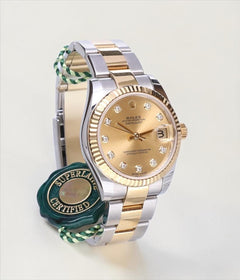 Rolex | Datejust | 178273 | Gold/Steel | 31 mm | Gold/Steel | Champagne | Automatic