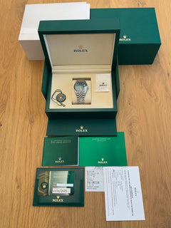 Rolex | Datejust | 12500 | Gold/Steel | 36 mm | Gold/Steel | Green | Automatic