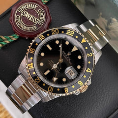 Rolex | GMT-Master II | 16713 | Gold/Steel | 40 mm | Gold/Steel | Black | Automatic