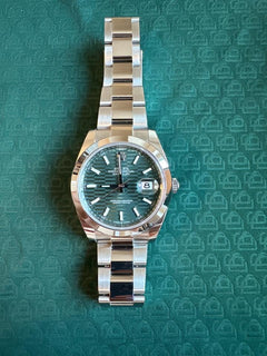 Rolex | Datejust | 126300 | White gold | 41 mm | Steel | Green | Automatic