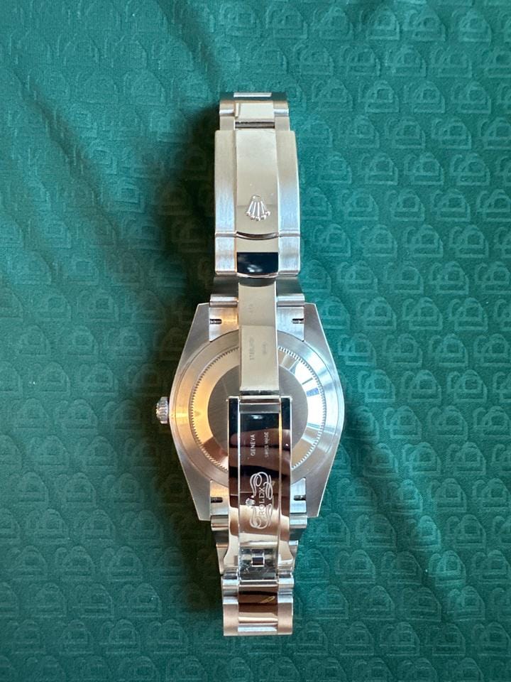 Rolex | Datejust | 126300 | White gold | 41 mm | Steel | Green | Automatic