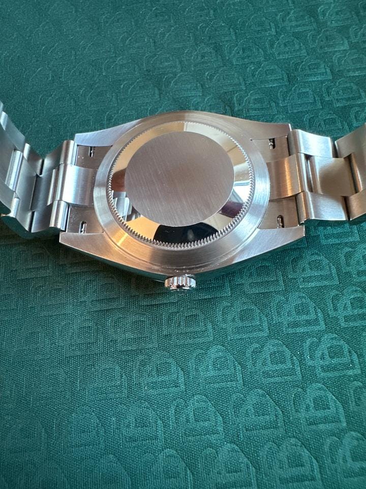 Rolex | Datejust | 126300 | White gold | 41 mm | Steel | Green | Automatic