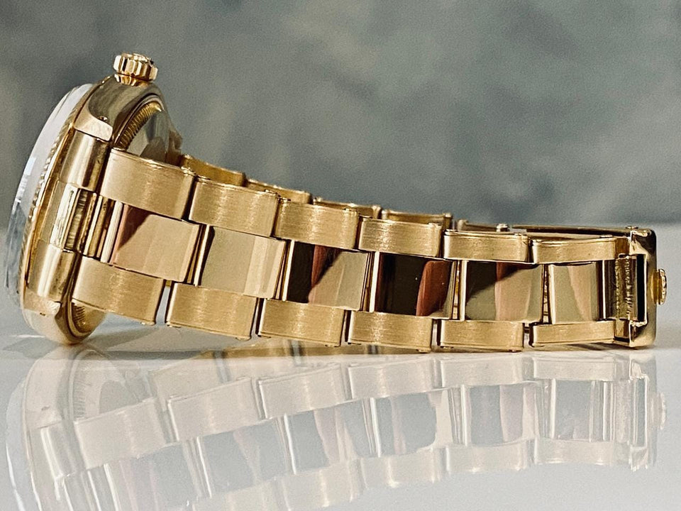 Rolex | Oyster Perpetual | 1005 | Yellow gold | 34 mm | Yellow gold | Silver | Automatic