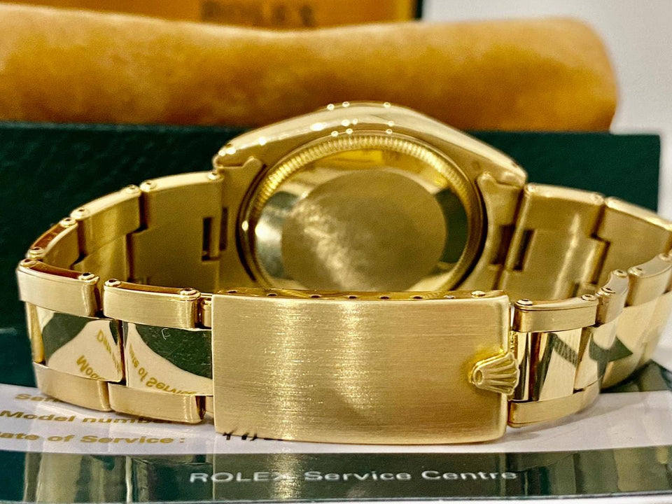 Rolex | Oyster Perpetual | 1005 | Yellow gold | 34 mm | Yellow gold | Silver | Automatic