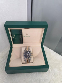 Rolex | GMT-Master II | 126713grnr | Steel | 40 mm | Gold/Steel | Black | Automatic