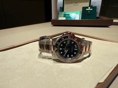 Rolex | GMT-Master II | 126711CHNR | 40 mm | Gold/Steel | Black | Automatic