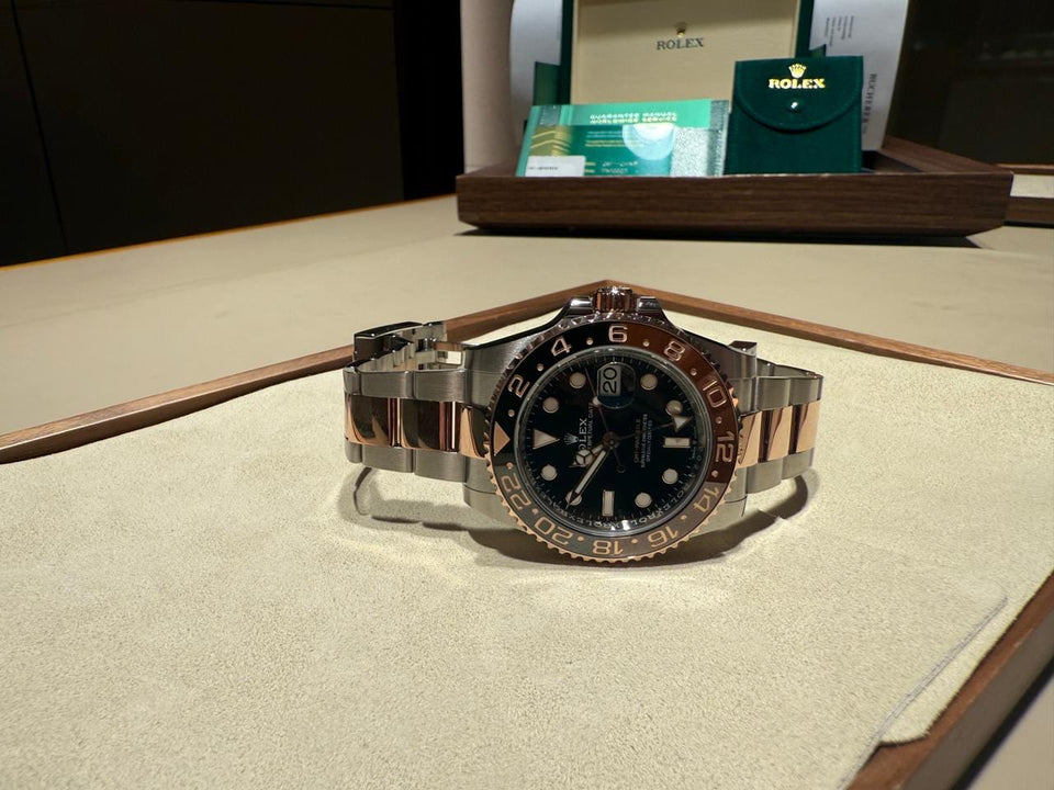 Rolex | GMT-Master II | 126711CHNR | 40 mm | Gold/Steel | Black | Automatic
