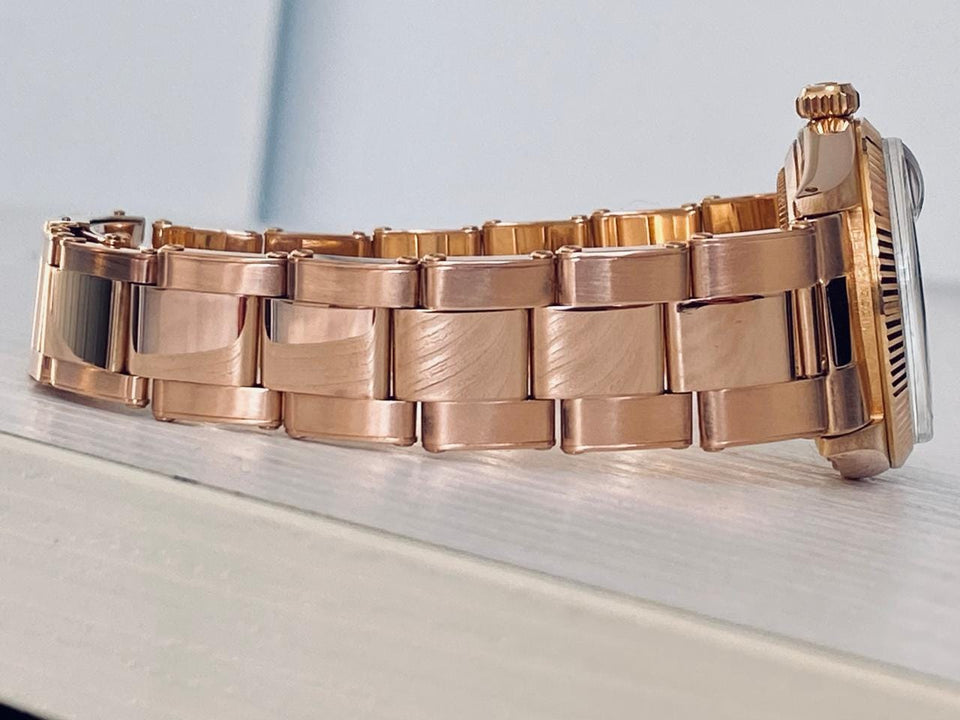 Rolex | Oyster Perpetual | 6627 | Rose gold | 31 mm | Rose gold | Silver | Automatic